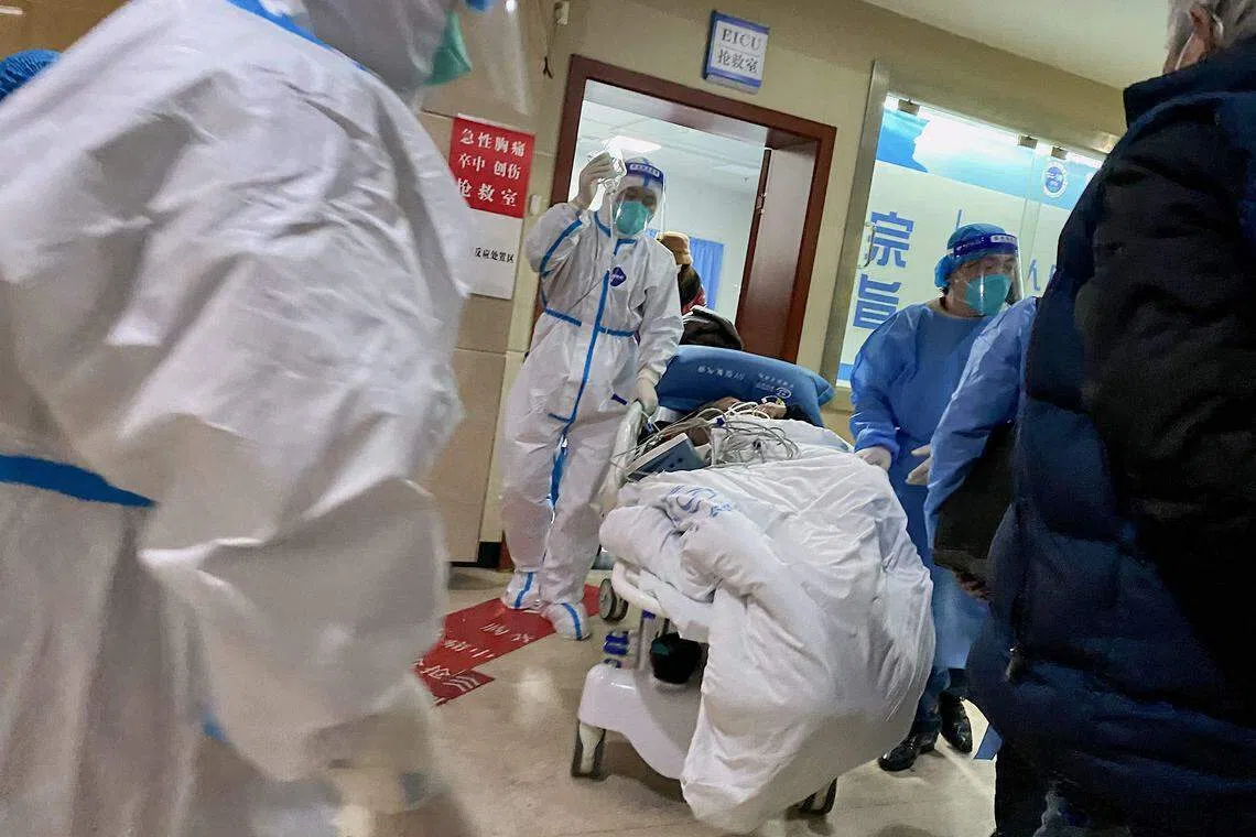 Health workers attending to a Covid-19  patient in China. The Omicron data comes from a briefing by China’s top scientists to the UN agency’s technical advisory group as concerns grow about the rapid spread of the virus in the world’s No 2 economy.