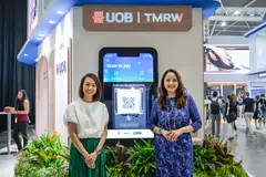 From left: Choo Wan Sim, head of UOB TMRW Digital (Singapore) and Jacquelyn Tan, head of group personal financial services, showcasing the "scan to pay" feature on UOB TMRW App. UOB customers in Singapore can now use the function to make payments in Malaysia, Thailand and Indonesia. 