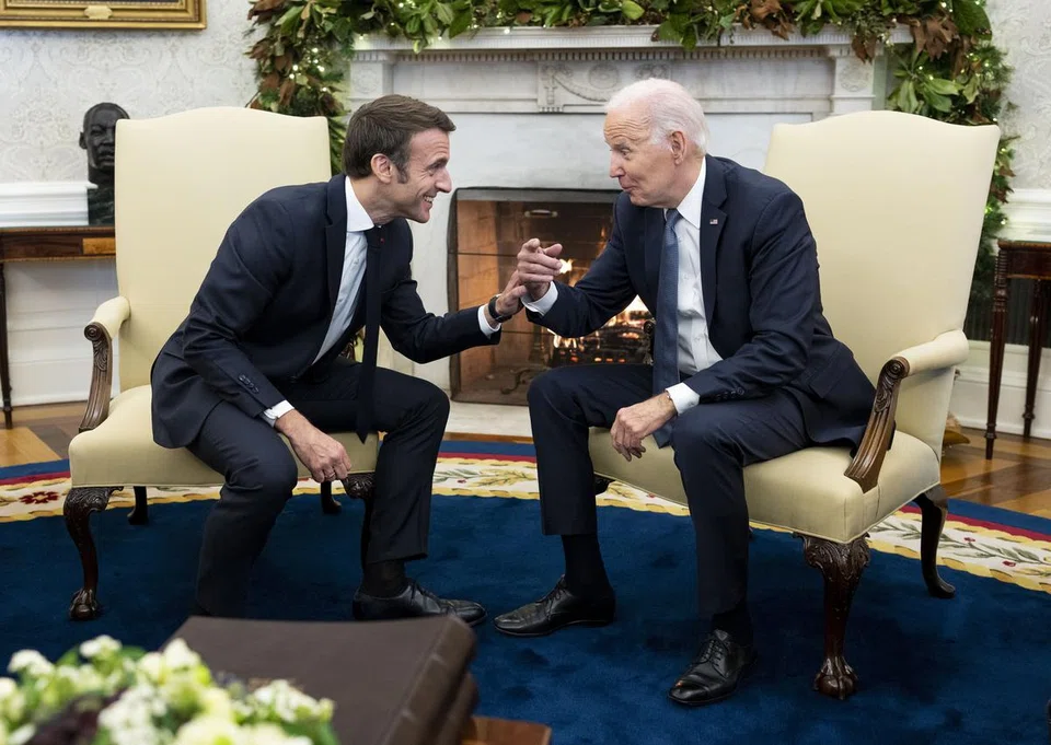 US President Joe Biden and French President Emmanuel Macron meeting in the Oval Office, at the White House in Washington on Dec 1. 