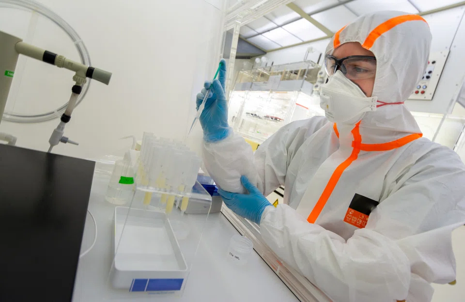 Geoscientist Jeremy McCormack is seen isolating zinc from shark tooth samples using a technique called column chromatography in a metal-free clean laboratory at the Max Planck Institute for Evolutionary Anthropology in Leipzig, Germany.