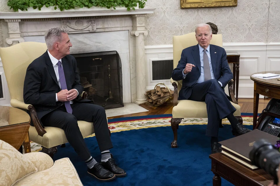 US President Joe Biden meets with House Speaker Kevin McCarthy to continue negotiations over increasing the debt limit, at the White House in Washington, May 22, 2023. 