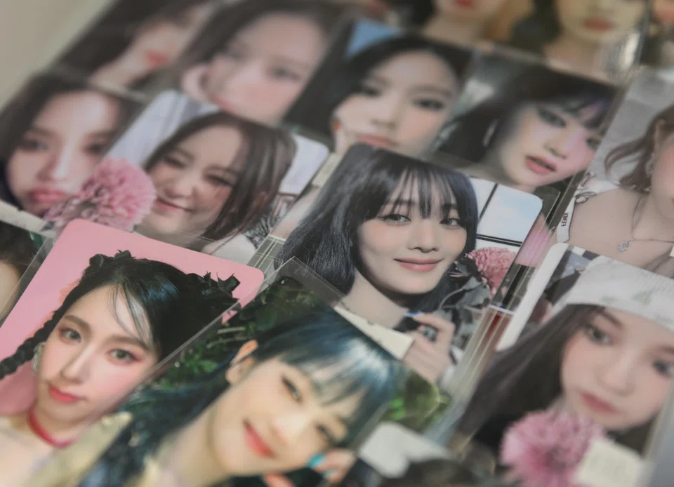 Photocards, viewed as collectors' items, are the cornerstone of K-pop merchandise.