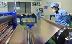 Workers at a production line of copper foils used for lithium batteries in Tongling, Anhui province, China. The premium for cash copper over three-month futures on the London Metal Exchange rose by as much as 91 per cent on Thursday. 