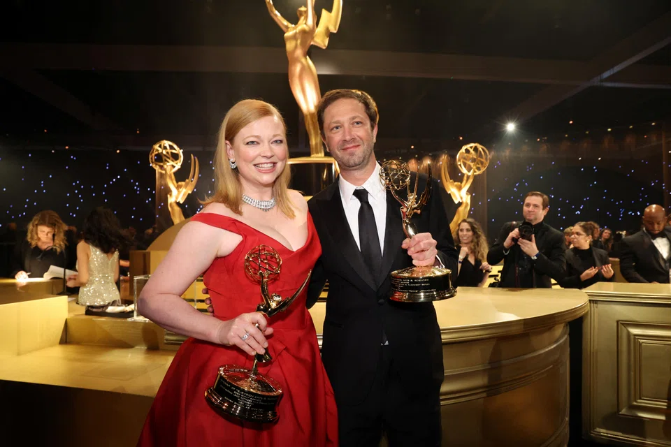 Sarah Snook, winner of the Lead Actress in a Drama Series award for "Succesion" and Ebon Moss-Bachrach pose with the award for Supporting Actor in a Comedy Series for "The Bear" at the 75th Primetime Emmy Awards Governor's Gala in Los Angeles.