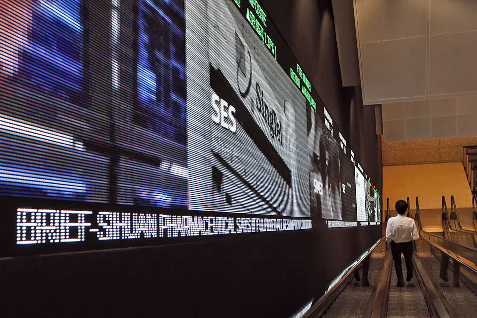 Investors eye buyout premium in undervalued Singapore stocks The