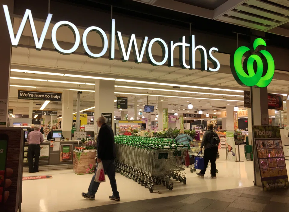 Woolworths Group and Coles Group will likely see growth in their half-year profit, according to analyst estimates, helped by higher shelf prices and lower Covid-19 related costs. 