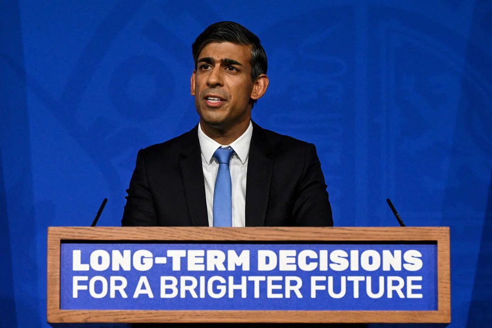 Britain's Prime Minister Rishi Sunak says his government remains committed to hitting its legally-binding target of producing net zero emissions by 2050.