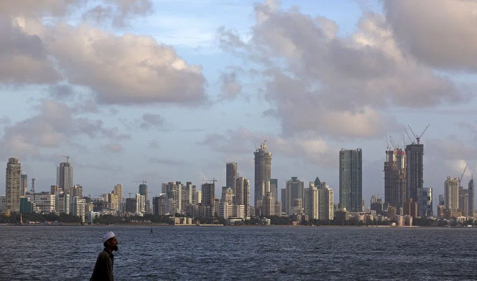 Scattered clouds are seen over Mumbai's skyline. Indian Prime Minister Narendra Modi’s popularity remains robust, giving him a platform to enact change that many world leaders would envy.
