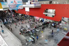 Visitors attend the China Import and Export Fair, also known as Canton Fair, in the southern city of Guangzhou, China, April 16, 2018. This year, 35,000 exhibitors have set up booths over roughly 1.5 million square metres to showcase fridges, gearboxes, anoraks and all manner of products. 
