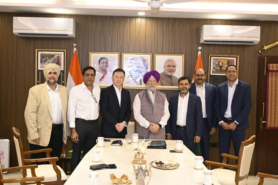 From left: Navjit Gill, country head of Gentari India; Anil Chalamalasetty, AM Green co-founder; Low Kian Min, chief renewables officer, Gentari; Hardeep Singh Puri, India's Minister for Petroleum and Natural Gas; Suhil Purohit, Gentari chief executive; Mahesh Kolli, AM Green co-founder; and Gautam Reddy, AM Green chief operating officer. 