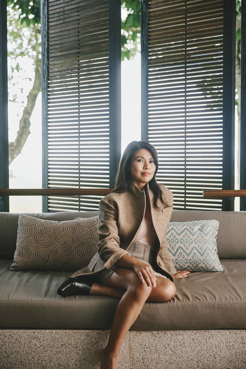 Marilyn Lum seeks inspirations in her Asian travels. Jacket, short skirt and leather slip-on heels by Fendi. Location: One&Only Desaru Coast.