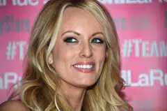 Adult film star Stormy Daniels poses at Chi Chi Larue's adult entertainment store in West Hollywood, California, May 23, 2018.