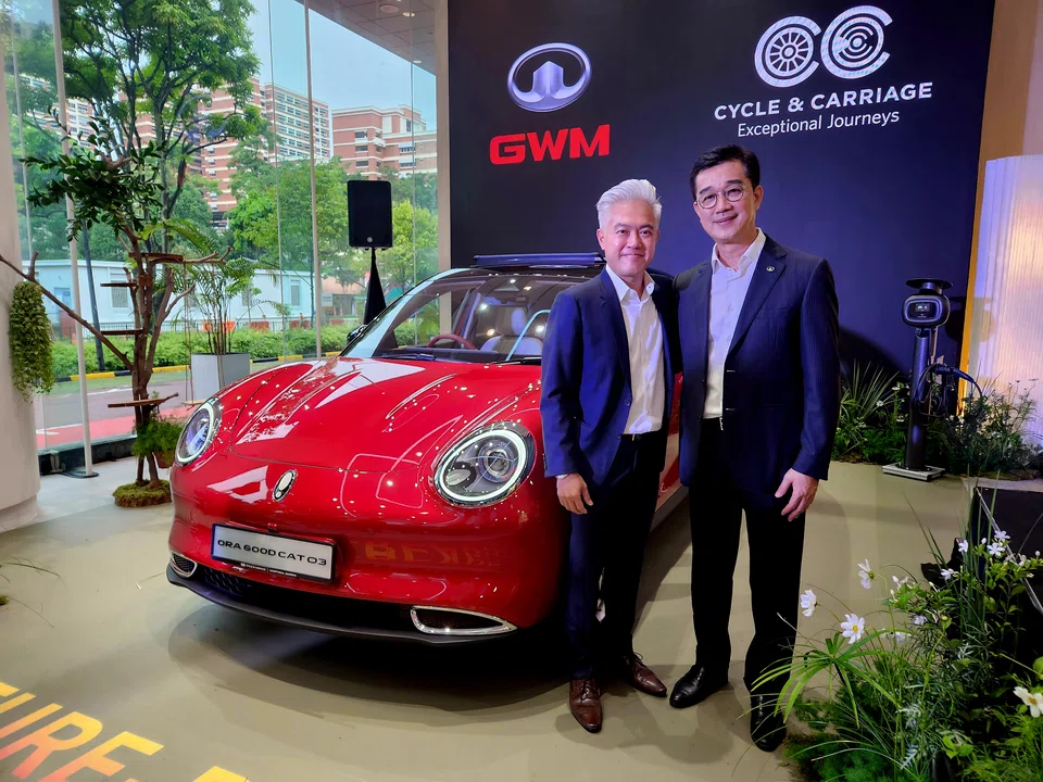 Wilfrid Foo (left), managing director of Direct Motor Interests for Jardine Cycle & Carriage, with Vudhigorn Suriyachantananont, vice-president of marketing in Asean for Great Wall Motor at the launch of the Ora Good Cat 03.