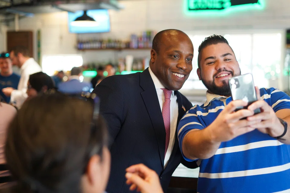 Wesley Hunt (left), a Republican who is likely to win his House race, during a campaign event in Cibolo, Texas., April 13, 2022. 