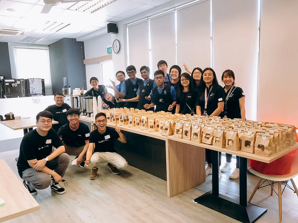 Foreword staff, DBS volunteers, and students and staff from Rainbow Centre's Yishun Park School.