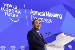 Li Qiang, China's premier, delivers a speech on the opening day of the World Economic Forum in Davos, Switzerland, on Jan 16, 2024. 
