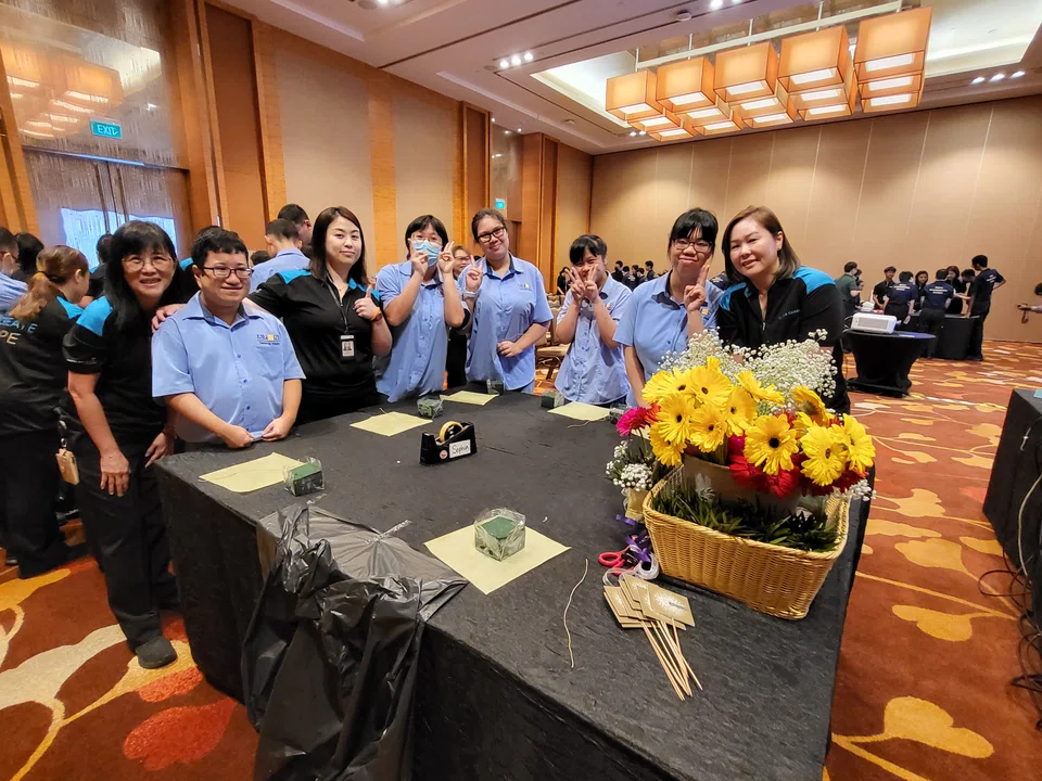 Beneficiaries from APSN Centre for Adults with staff volunteers from MBS. 