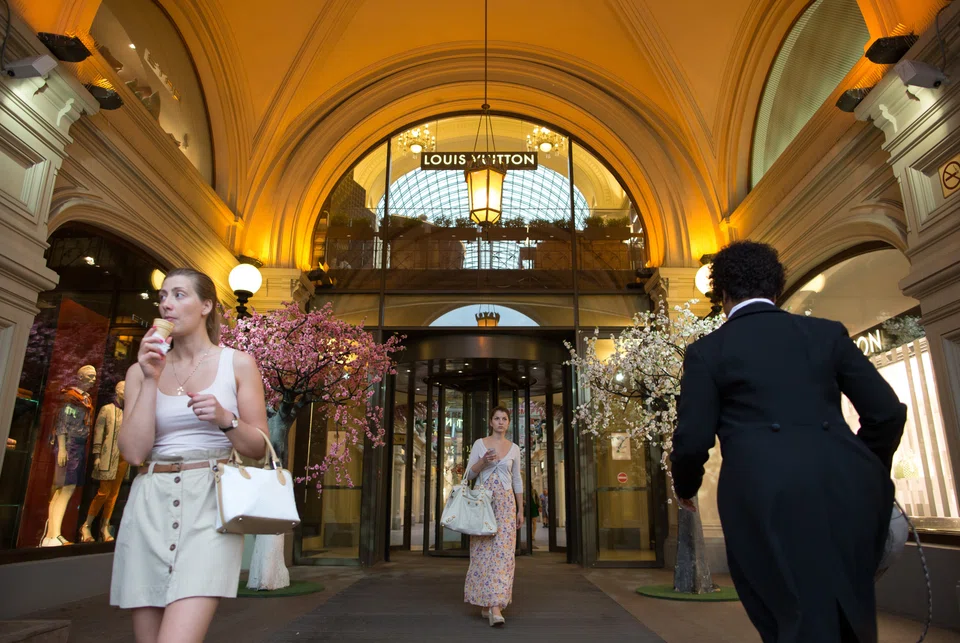 Visitors at the entrance to the GUM department store in Moscow, Russia, in May. Inflation soared to 20-year highs in annual terms following Moscow's invasion of Ukraine. 