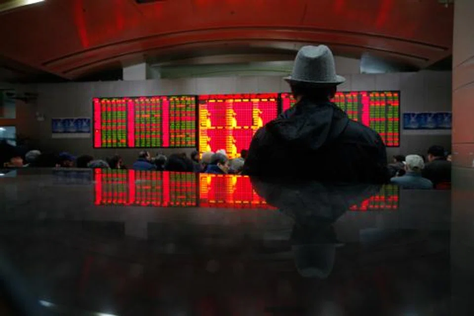 Shares in Shanghai finished Friday with losses as global markets go into reverse on recession fears, though Chinese traders were lifted by hopes for fresh growth-boosting measures from the government.
