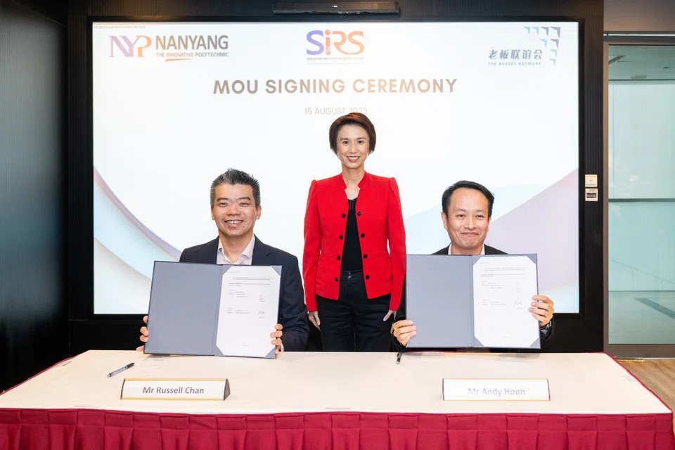 From left: Russell Chan, principal and chief executive officer of Nanyang Polytechnic; Minister of State for Trade and Industry Low Yen Ling; and Andy Hoon, chairman of Bosses Network.