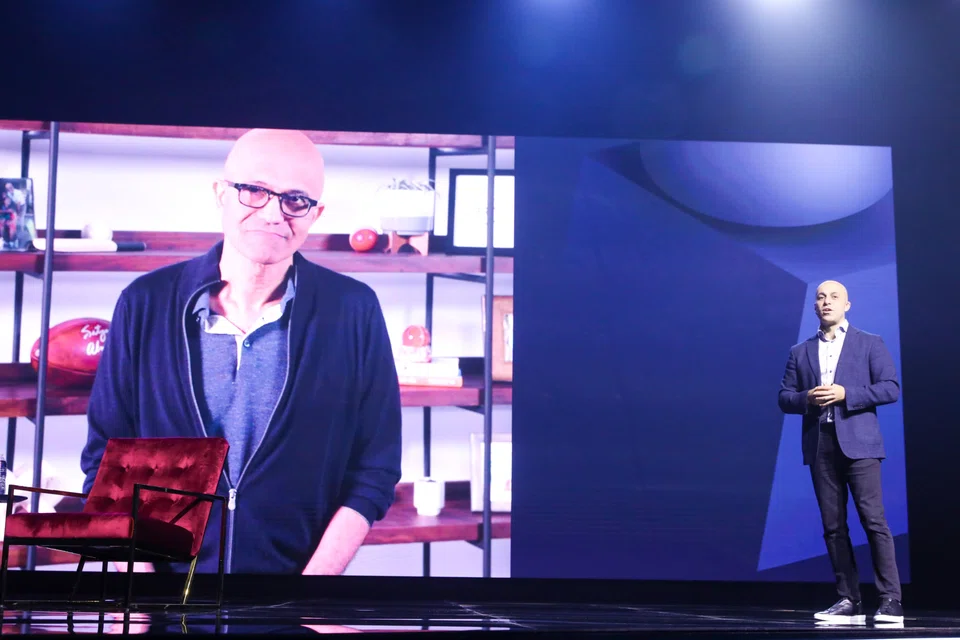 Microsoft CEO Satya Nadella (left, with Databricks CEO Ali Ghodsi) calls for conversations on responsible AI and the technology’s societal impact.