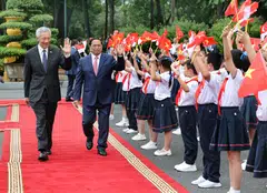 Prime Minister Lee Hsien Loong was welcomed by Vietnamese Prime Minister Pham Minh Chinh at the Presidential Palace in Hanoi on Monday.