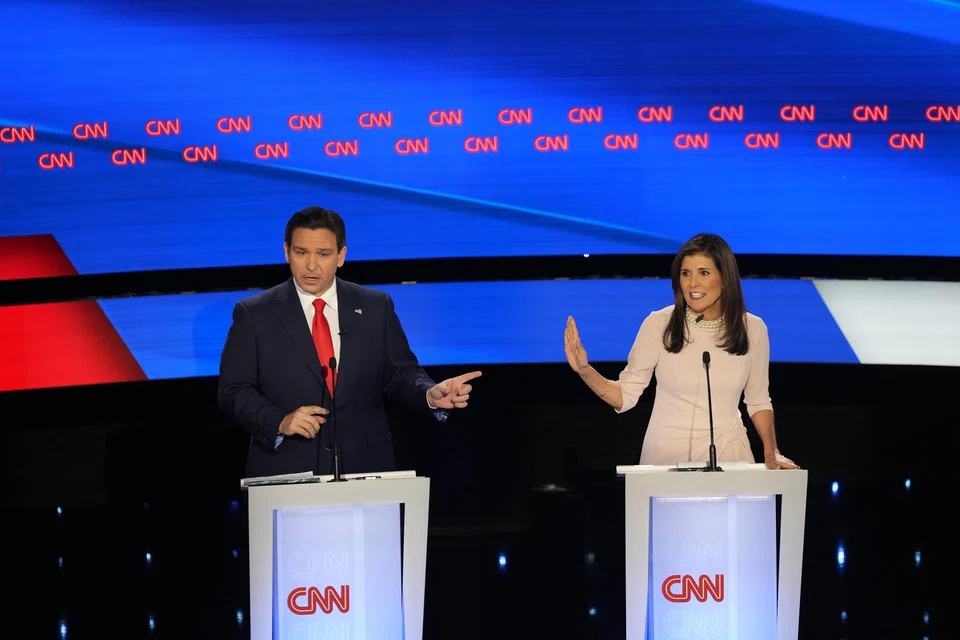 Florida governor Ron DeSantis and Nikki Haley, the former governor of South Carolina, exchange remarks during the fifth Republican presidential debate at Drake University in Des Moines, Iowa, Jan 10, 2024. 