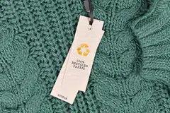 Cotton fabric labelled as "100% recycled fabric". Britain's Competition and Markets Authority (CMA) is concerned that shoppers are being misled and potentially even paying a premium for products that aren’t what they seem.
