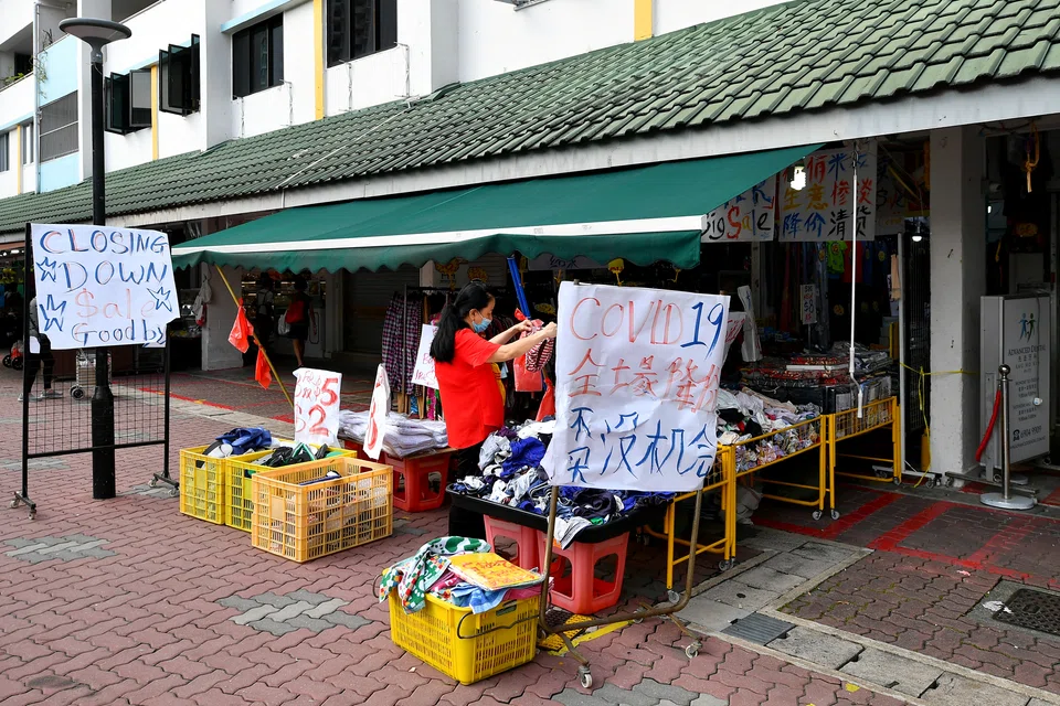 A closing-down sale opposite Chong Boon Market and Food Centre in June 2021. The number of business closures sank to 42,463 in 2020 – down from 47,321 in 2019 and 44,816 in 2018 – but has been on an uptrend since then.