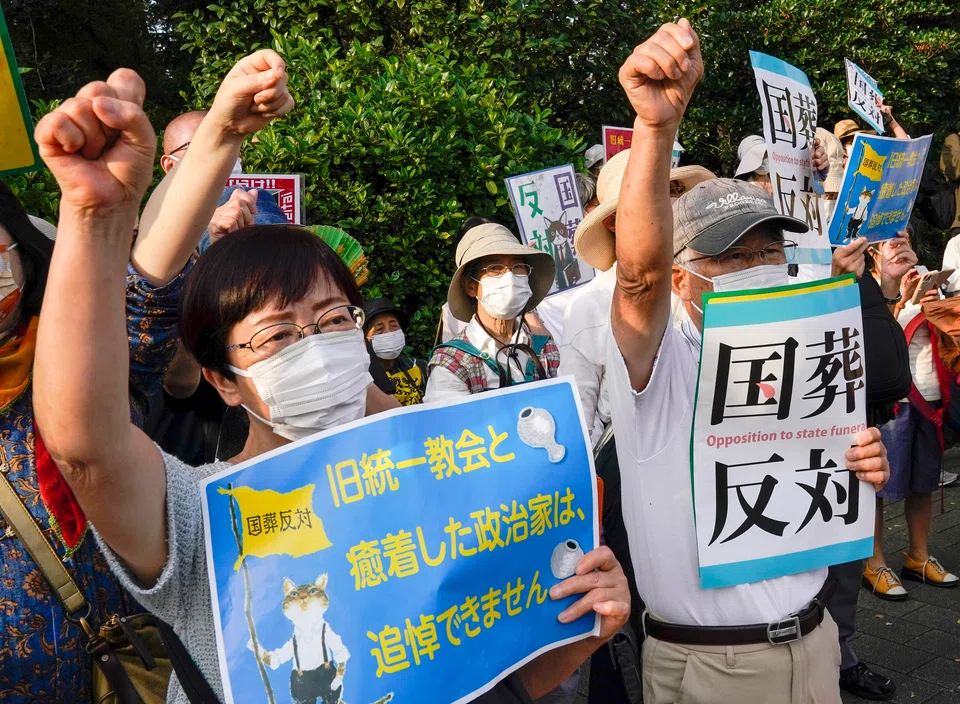Protesters holding placards reading 'No!! State funeral' at a rally against the state funeral of former Prime Minister Shinzo Abe in Tokyo.
