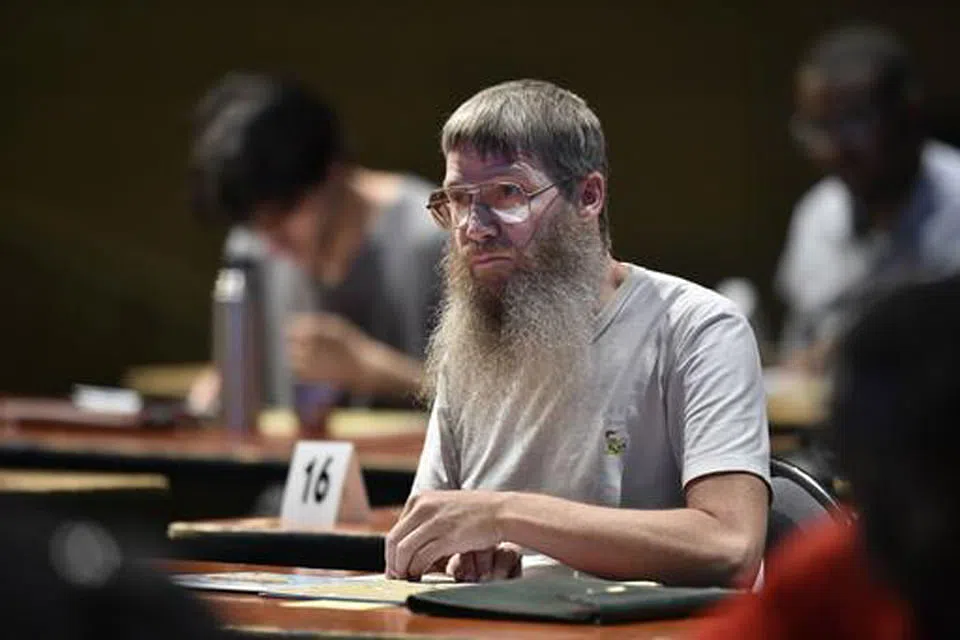 Scrabble's world champ masters the tiles in two languages