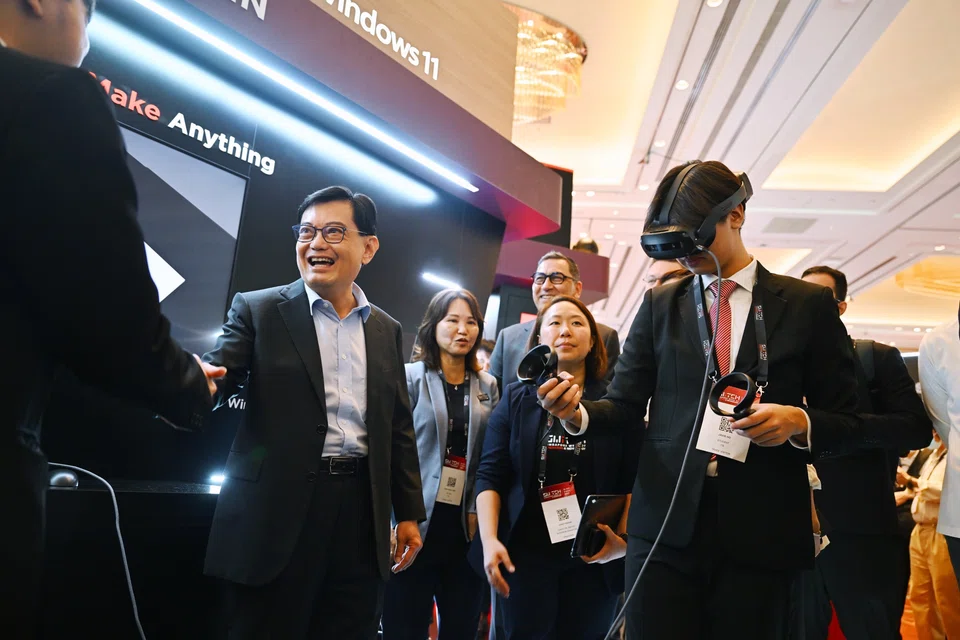 Deputy Prime Minister Heng Swee Keat (second from left) at this year’s edition of the Singapore Week of Innovation and Technology on Oct 31.