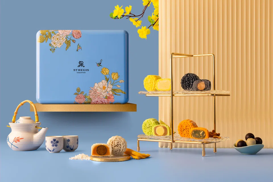 St. Regis Singapore's elegant blue tin filled with mini snowskin mooncakes.