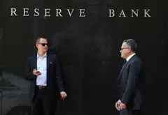 Australia's central bank raised interest rates more than expected Tuesday and warned of more increases as officials try to rein in "significantly" high inflation. 