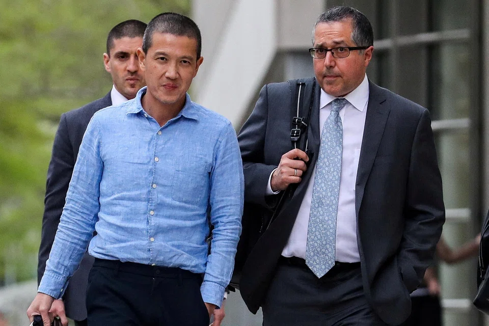 Ex-Goldman Sachs banker Roger Ng (L) was scheduled to begin a 10-year prison sentence in October last year, but US officials allowed the sentence to be deferred so that he could return to the South-east Asian country and help with its investigation. 