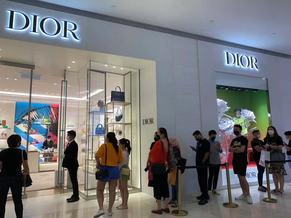 Shoppers queuing at one of the luxury stores in Pavilion Kuala Lumpur. 