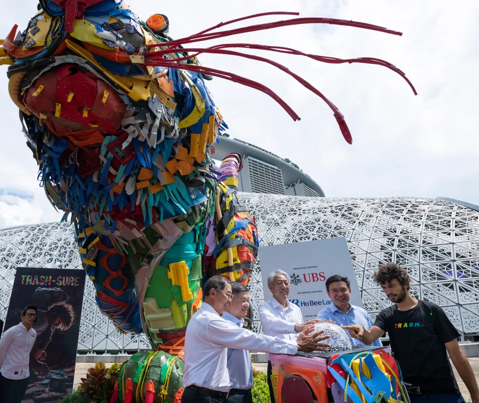 At the launch of the Trash-Sure campaign on Aug 1 are (left to right) Gardens by the Bay chairman Niam Chiang Meng; Ho Bee Land CEO Nicholas Chua, Senior Minister Teo Chee Hean, UBS Asia-Pacific president Edmund Koh, and artist Bordalo II.