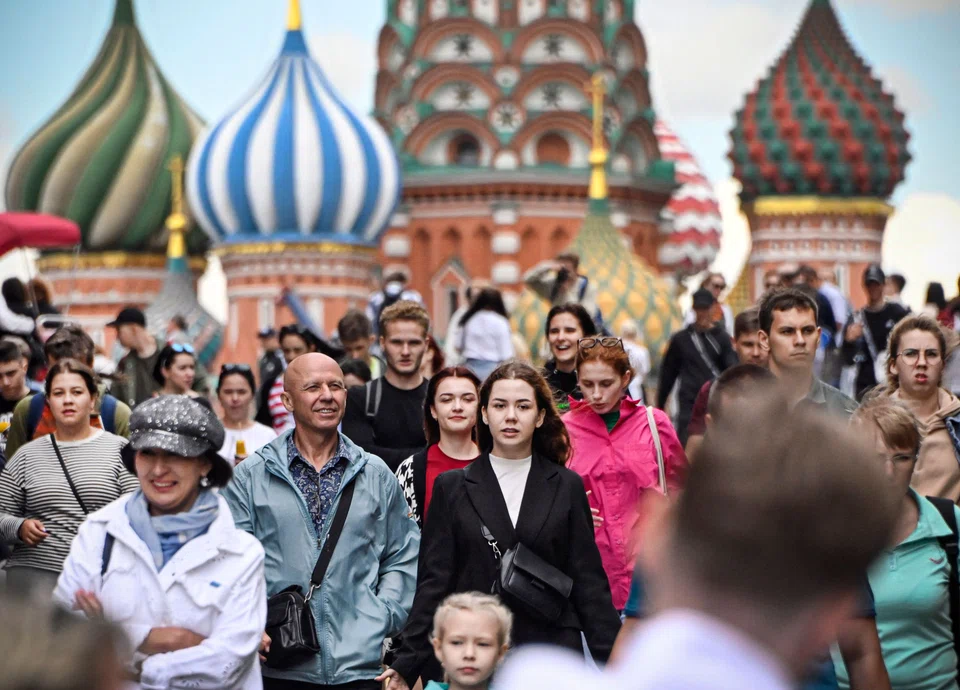 Crowds in the Red Square in front of the famed St Basil's Cathedral in central Moscow in July.  The country's First Deputy Prime Minister Andrei Belousov said that despite unprecedented sanctions and many foreign companies leaving Russia, the government has seen no signs that the labour market situation is worsening