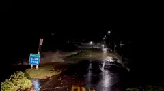 A social media video shows high tides rising due to a storm in Arkles Bay, Auckland, New Zealand on Monday (Feb 13). 