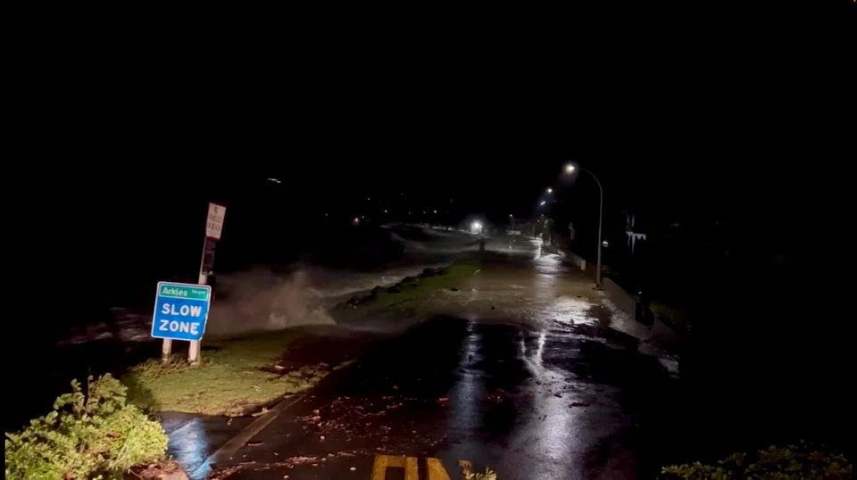 A social media video shows high tides rising due to a storm in Arkles Bay, Auckland, New Zealand on Monday (Feb 13). 