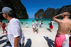 Tourists at Maya Bay early this year, after Thailand reopened its world-famous beach after a three-year-long closure wrought by the pandemic. Thai finance minister Arkhom Termpittayapaisith says the nation appeals to travellers looking for bargains, and that the baht’s prolonged weakness will  help bring more foreigners back, 