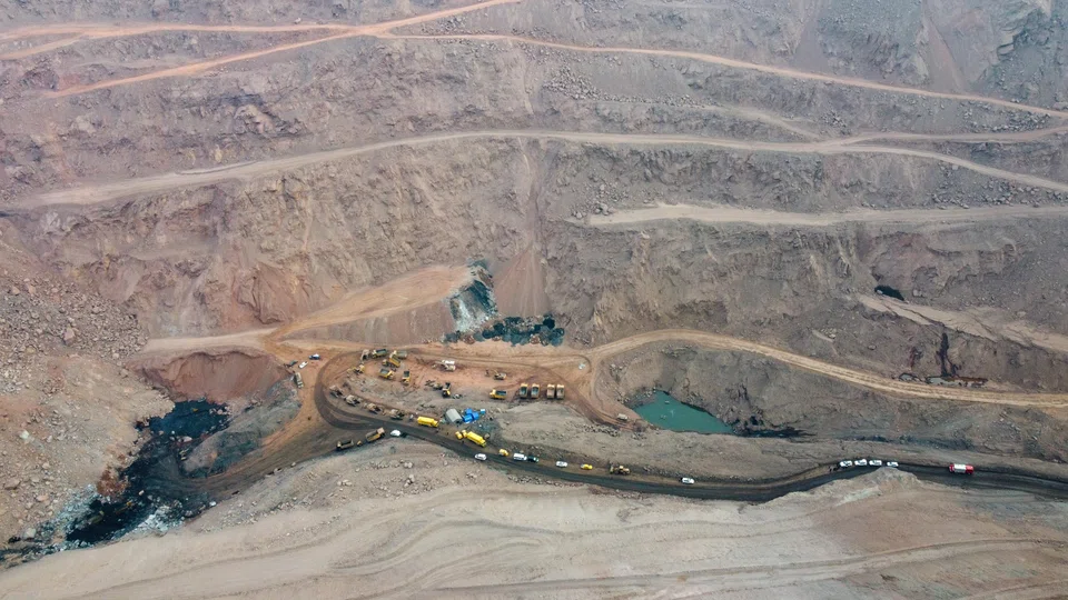  An aerial view of rescue vehicles working at the site of a collapsed coal mine in Alxa League, north China's Inner Mongolia Autonomous Region.