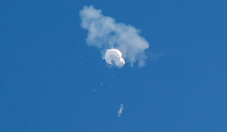 The China balloon drifts to the ocean after being shot down off the coast in Surfside Beach, South Carolina.