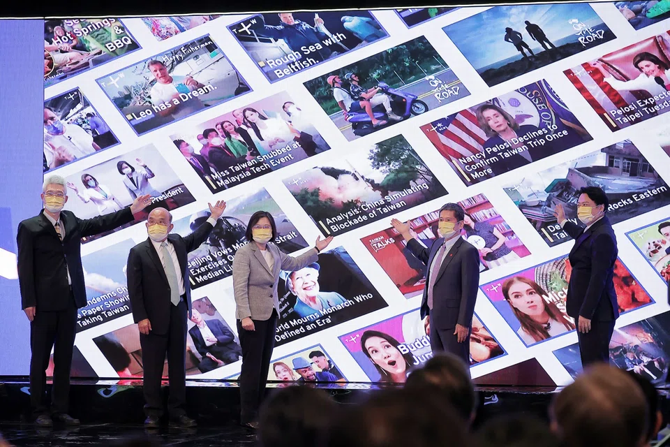 This handout photo taken and released by the Taiwan Presidential Office on Monday (Oct 3) shows President Tsai Ing-wen (centre) at the launch of the new English-language TV channel TaiwanPlus in Taipei.  
