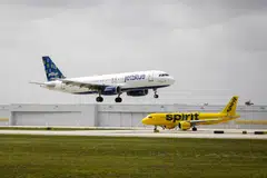 JetBlue Airways raised its offer to purchase Spirit Airlines, the latest move in a multi-billion dollar takeover contest with rival Frontier Group Holdings, with both would-be suitors battling to secure a swift track to expansion as domestic travel demand surges. 