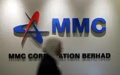 Malaysian tycoon Syed Mokhtar Al-Bukhary's conglomerate MMC may sell a stake of up to 30 per cent in MMC Ports.