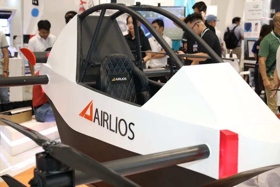 A model of Airlios' new electric flying car on display at the Vietnam Motor Show in Ho Chi Minh City.