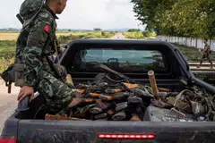 A member of the Karenni Army rides a truck with sized weapons during a battle in Loikaw in Kayah State, Myanmar. The rebellion has presented the biggest battlefield challenge to Myanmar’s military since it seized power in a coup in 2021.