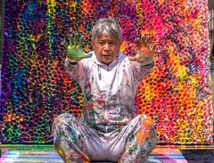 Zhuang's art transcends mere aesthetics, revealing layers of intricate detail and storytelling that burst forth from the canvas.