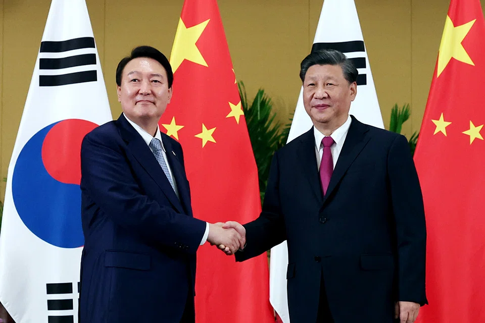 South Korean President Yoon Suk-yeol (left) and Chinese counterpart Xi Jinping held their first face-to-face talks on the sidelines of the Group of 20 conference in Bali.